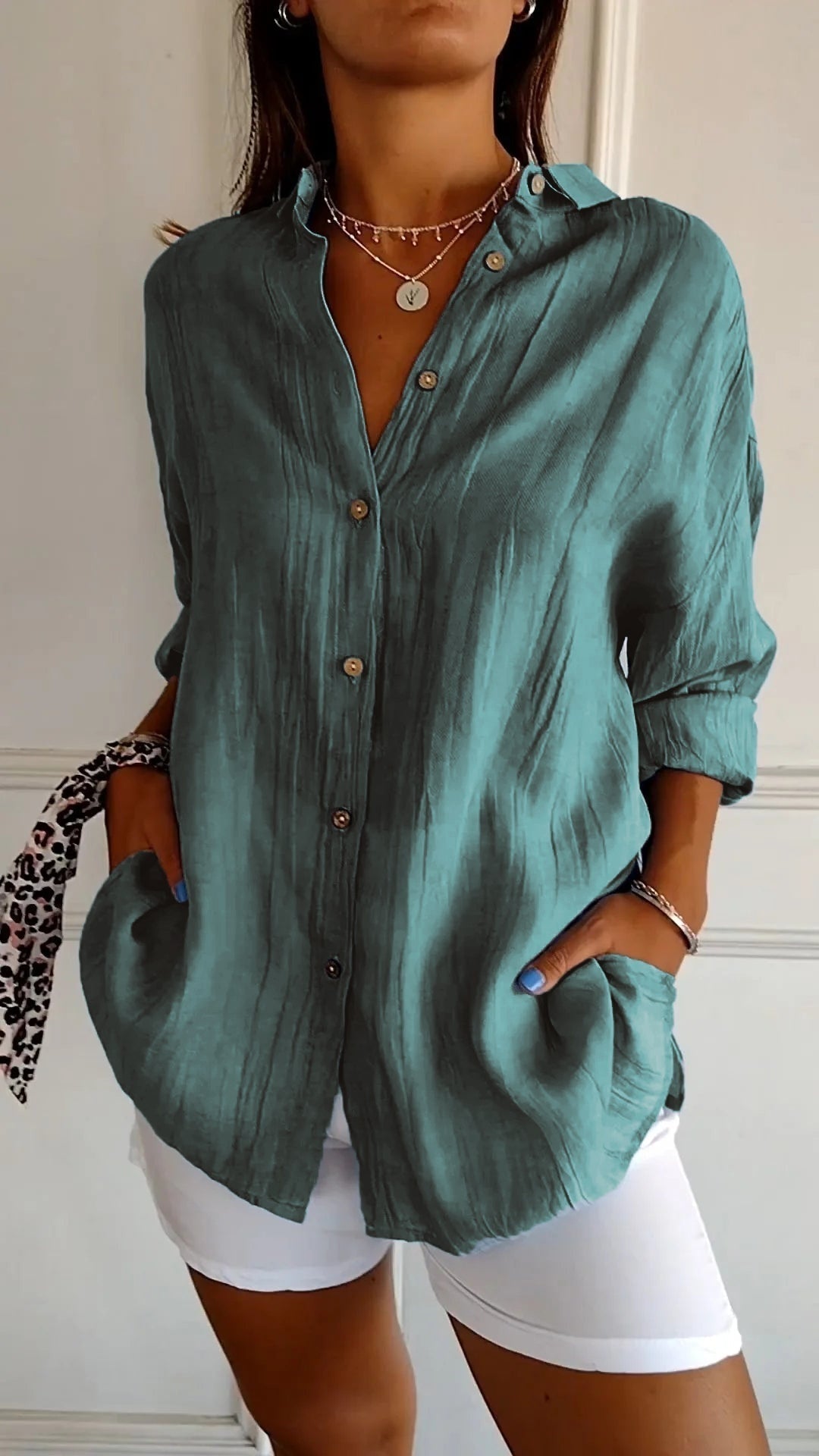 Blouse turquoise vooraanzicht Puck